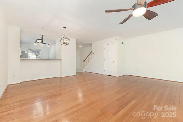 a kitchen with cabinets appliances and a window