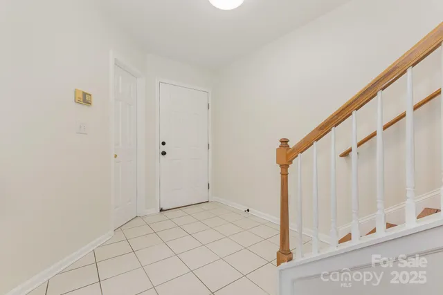 a view of a room with a dishwasher and a window