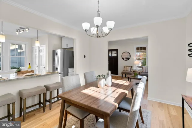 a view of a dining room and a wooden floor