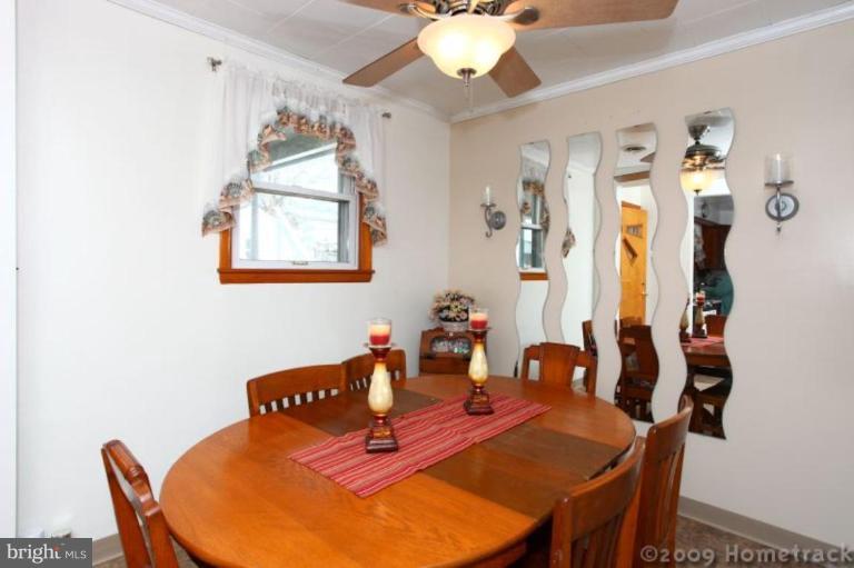 216 Nanticoke Road Essex, MD 21221 - Photo 2 of 19 a view of a dining room with furniture