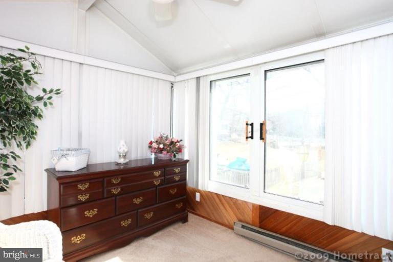 216 Nanticoke Road Essex, MD 21221 - Photo 17 of 19 a room with a bed and a window