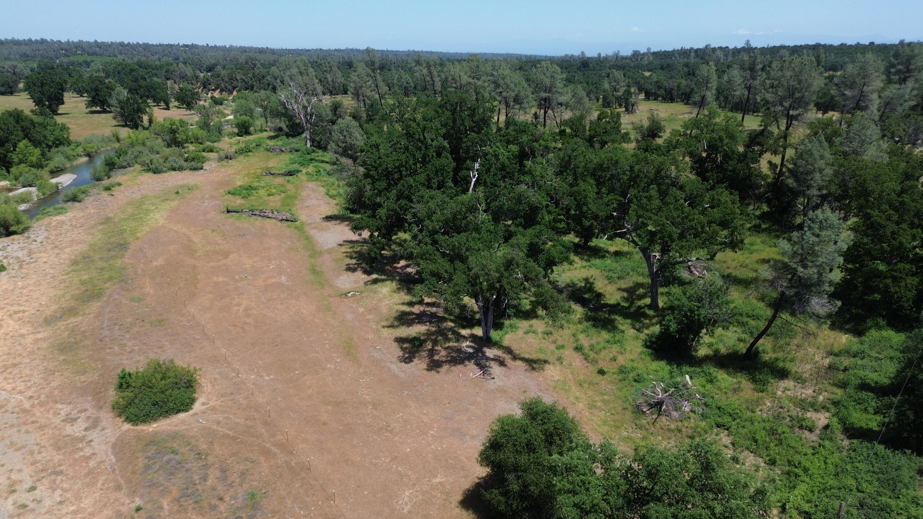 Lot 62 Bowman Road Cottonwood, CA 96022 - Photo 12 of 14 an aerial view of a houses with a yard