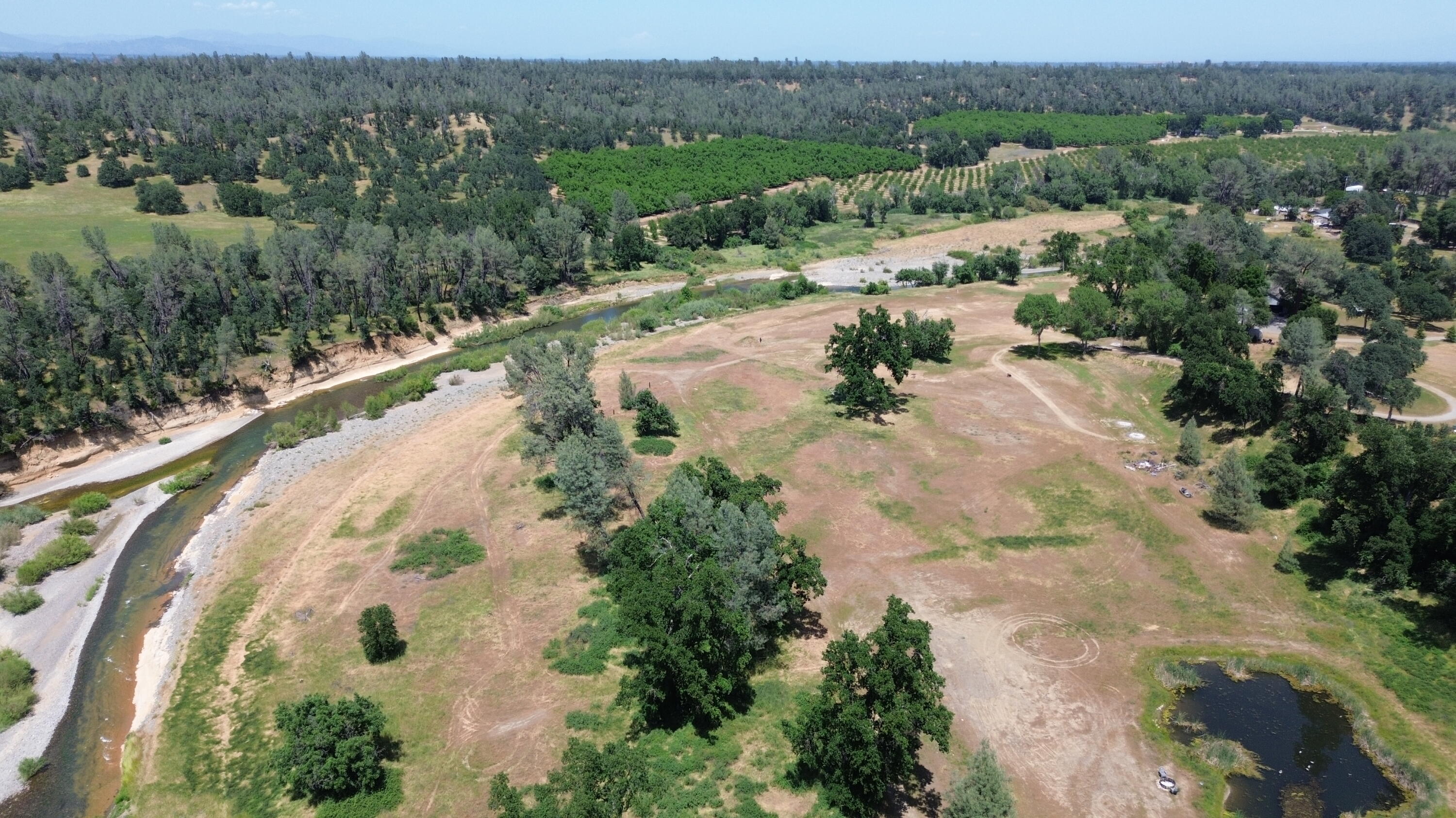 Lot 62 Bowman Road Cottonwood, CA 96022 - Photo 3 of 14 an aerial view of a house with mountain view