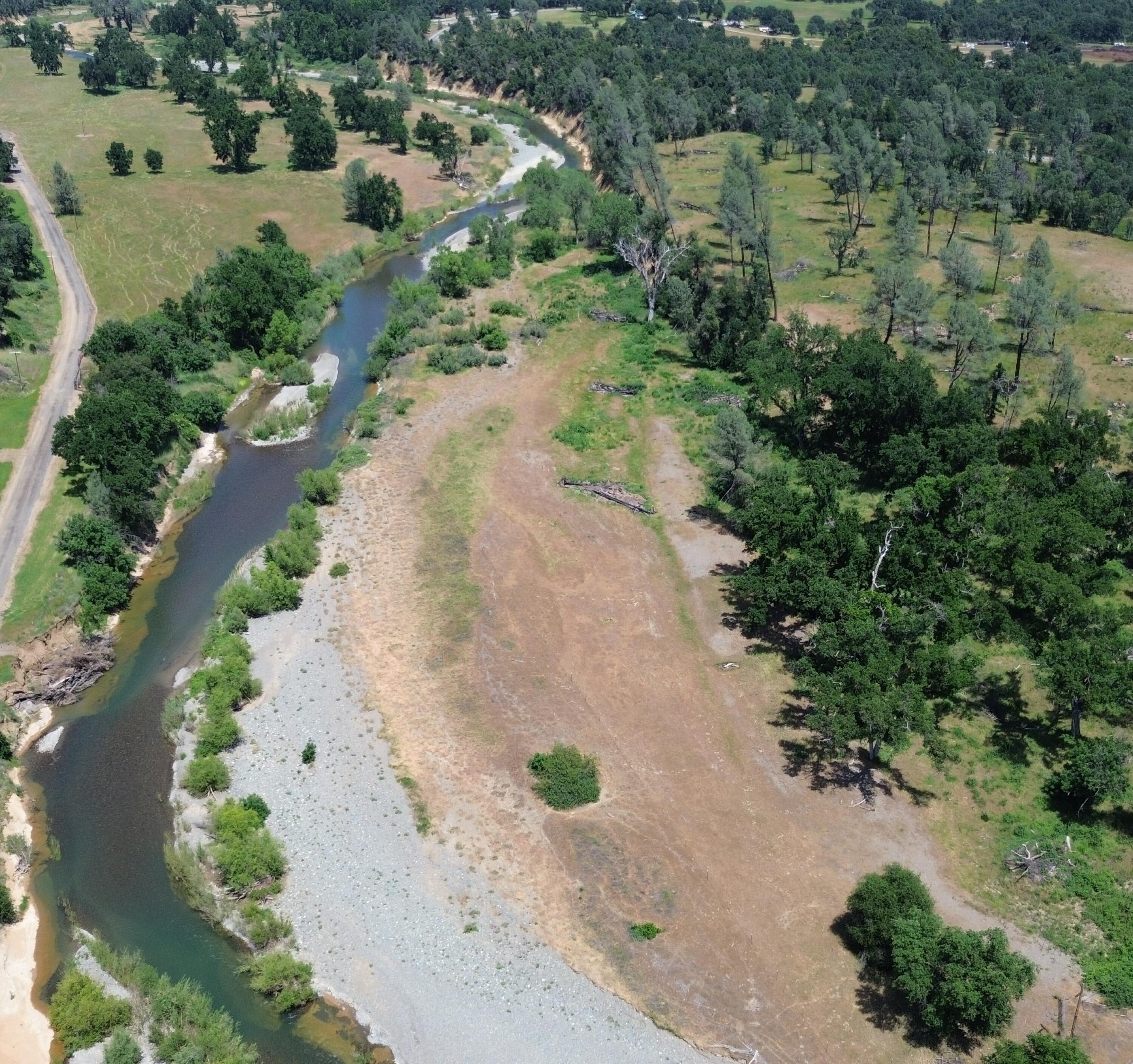 Lot 62 Bowman Road Cottonwood, CA 96022 - Photo 4 of 14 an aerial view of a house with a yard