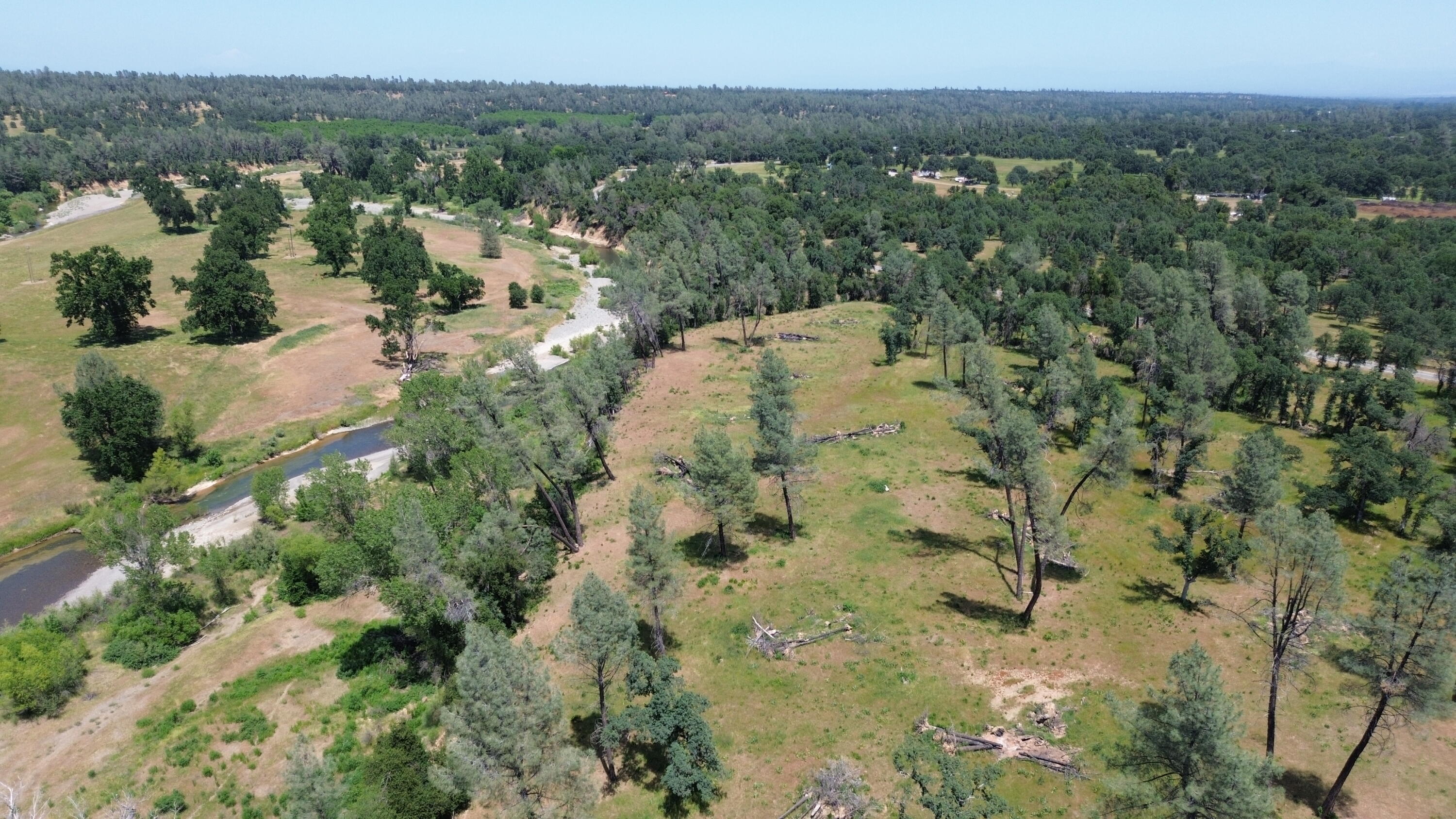 Lot 62 Bowman Road Cottonwood, CA 96022 - Photo 6 of 14 an aerial view of a houses with a yard