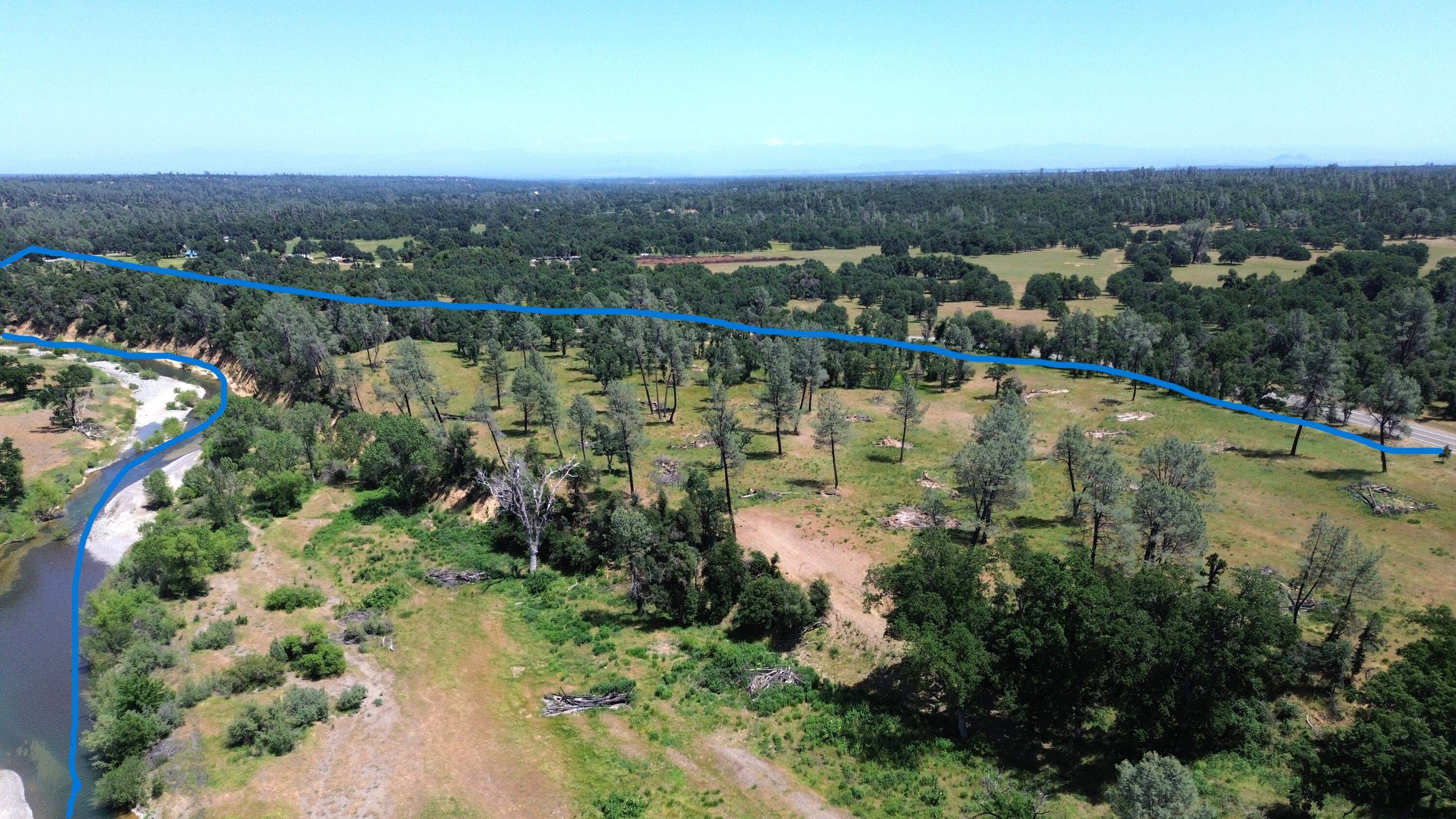 Lot 62 Bowman Road Cottonwood, CA 96022 - Photo 9 of 14 an aerial view of residential houses with outdoor space and trees