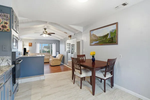 a view of a livingroom and dining room