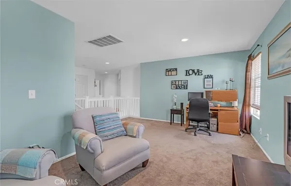 a workspace with furniture and a couch