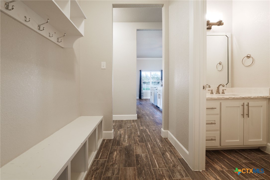 2662 Snow Road Kempner, TX 76539 - Photo 11 of 28 a view of a hallway with wooden floor