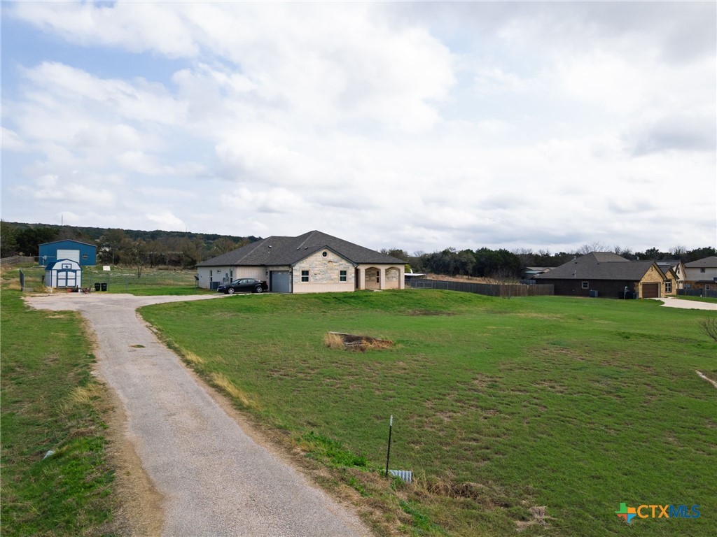 2662 Snow Road Kempner, TX 76539 - Photo 2 of 28 a view of a garden with houses