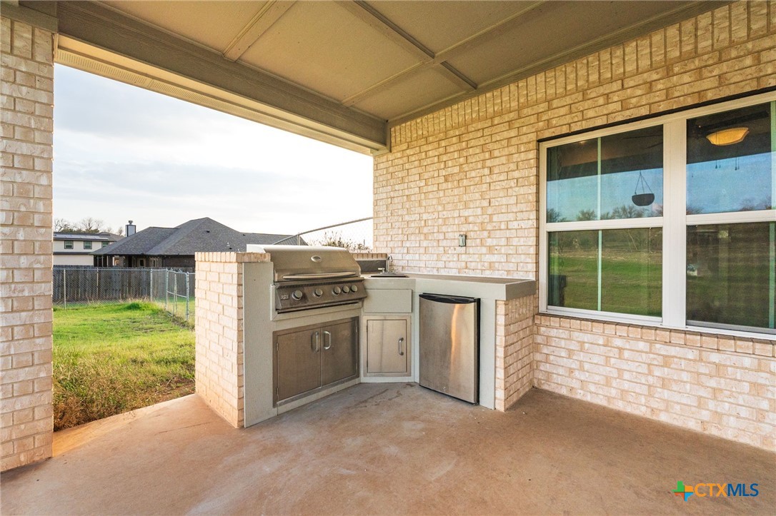 2662 Snow Road Kempner, TX 76539 - Photo 21 of 28 a view of a kitchen with a stove