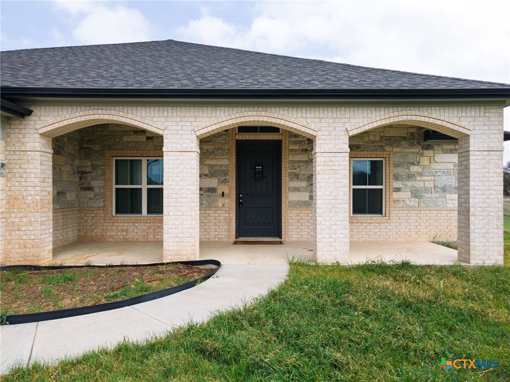 2662 Snow Road Kempner, TX 76539 - Photo 3 of 28 a front view of a house with garden