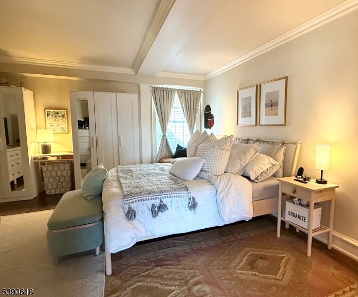 12 Elm Street, Unit B Morristown, NJ 07960 - Photo 11 of 16 a bedroom with a bed and a couch