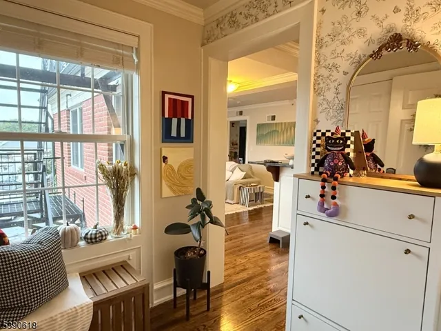 a view of living room with furniture and flat screen tv