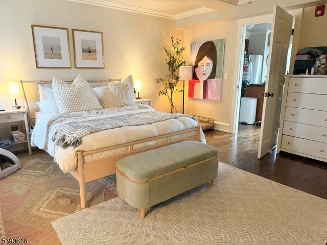 a bedroom with a bed and a cabinets