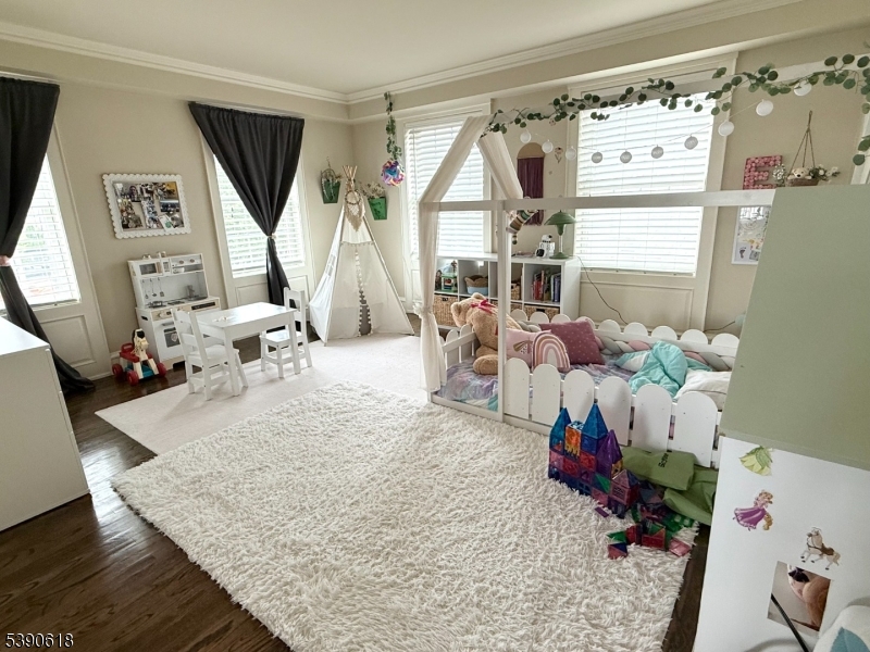12 Elm Street, Unit B Morristown, NJ 07960 - Photo 5 of 16 a living room with furniture and a window