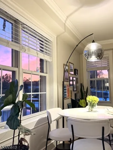 a front view of a dining room with furniture