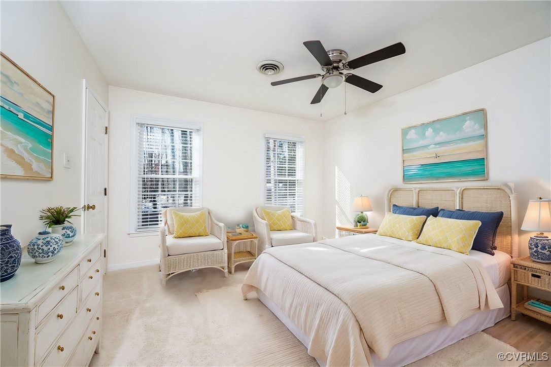 4600 Cedar Cliff Road Chester, VA 23831 - Photo 27 of 37 a bedroom with a bed and ceiling fan