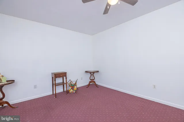 a room with a table and gym equipment