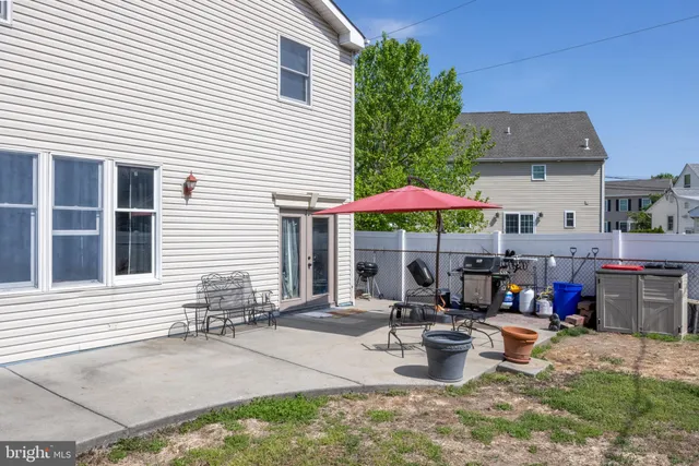 front view of a house with a patio