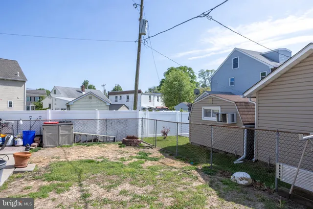 a view of a back yard of the house