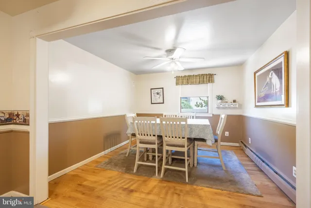 a view of a dining room with furniture