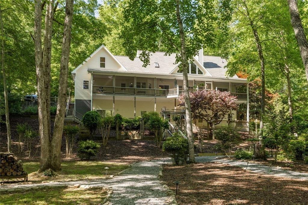 704 Riverbend Road Blairsville, GA 30512 - Photo 23 of 89 a front view of a house with garden