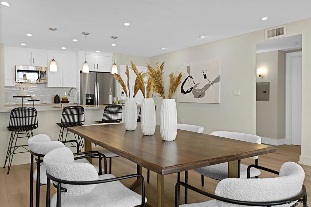 2500 Torrey Pines Road, Unit 503 La Jolla, CA 92037 - Photo 14 of 46 a view of a dining room with furniture