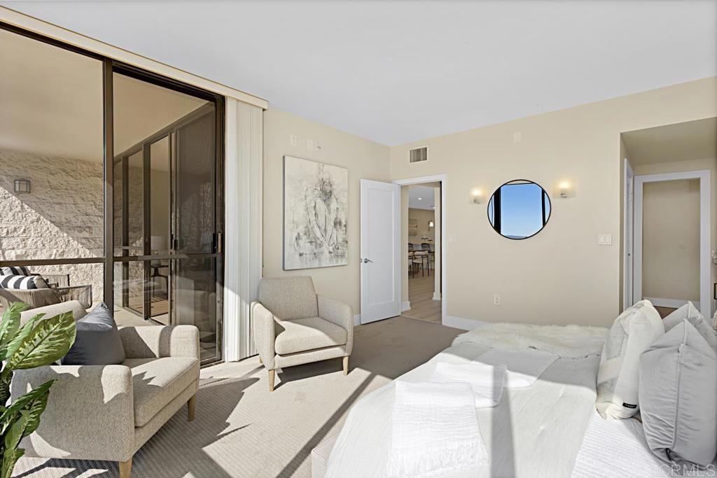 2500 Torrey Pines Road, Unit 503 La Jolla, CA 92037 - Photo 17 of 46 a bedroom with a large bed and a large window