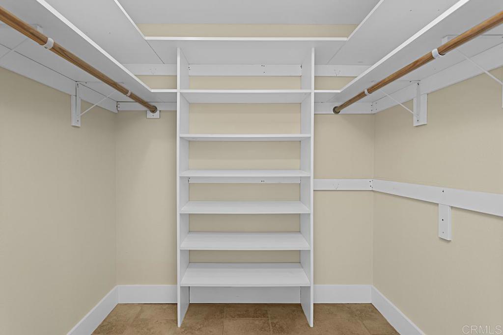 2500 Torrey Pines Road, Unit 503 La Jolla, CA 92037 - Photo 23 of 46 a view of walk in closet with empty racks