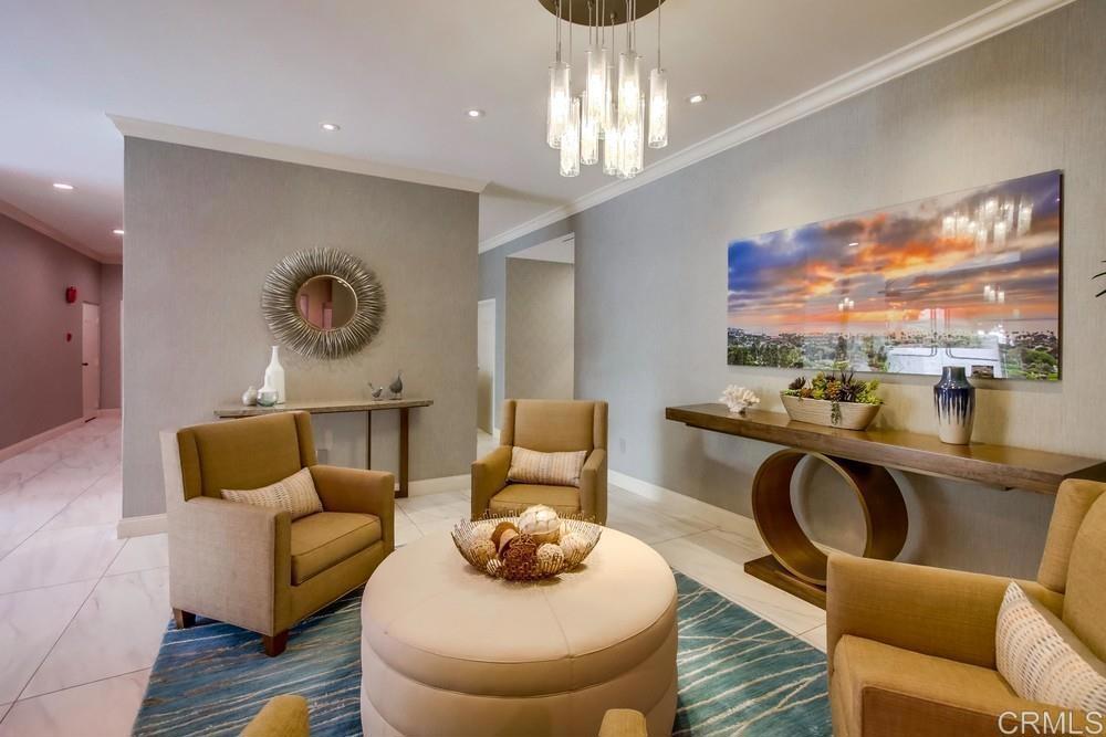 2500 Torrey Pines Road, Unit 503 La Jolla, CA 92037 - Photo 32 of 46 a living room with furniture a rug and a large window