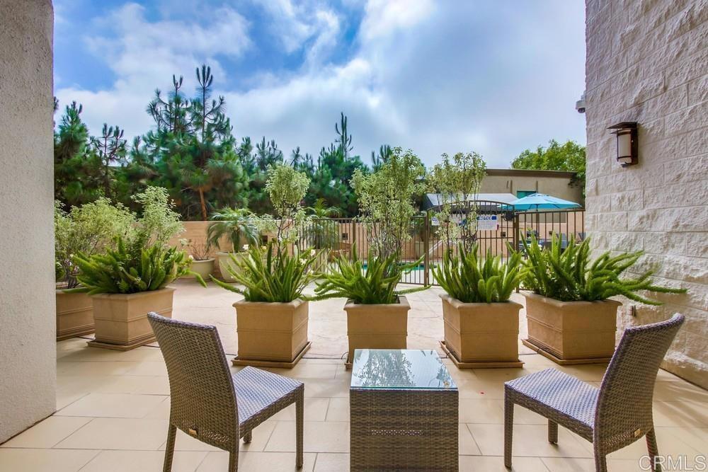 2500 Torrey Pines Road, Unit 503 La Jolla, CA 92037 - Photo 41 of 46 a view of a chair and table in the patio