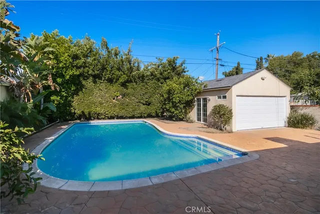 a view of a swimming pool with an outdoor space