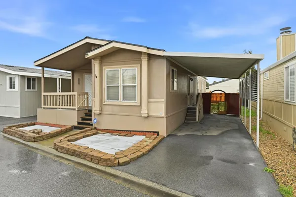 a front view of a house with entertaining space