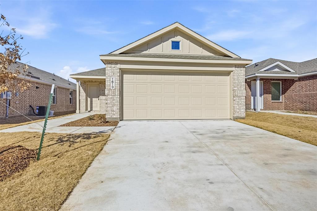 1613 Elliott Road Howe, TX 75459 - Photo 1 of 19 a front view of a house with a yard