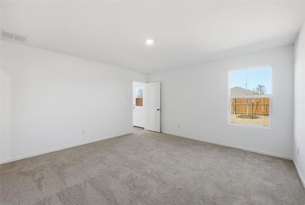 1613 Elliott Road Howe, TX 75459 - Photo 11 of 19 an empty room with windows