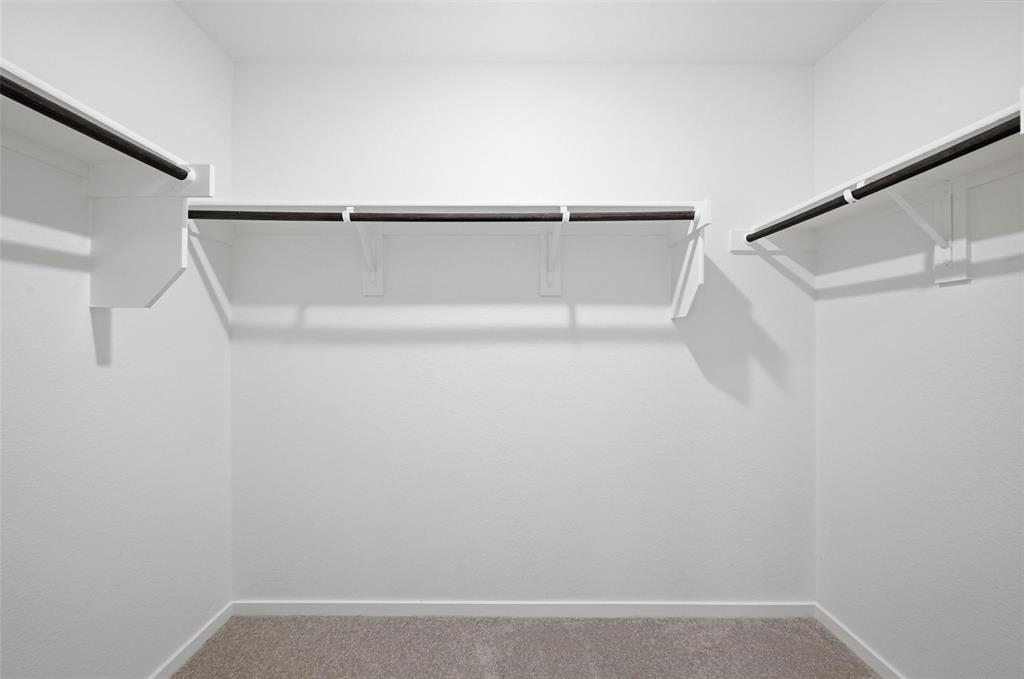 1613 Elliott Road Howe, TX 75459 - Photo 12 of 19 a view of small space with racks on the wall