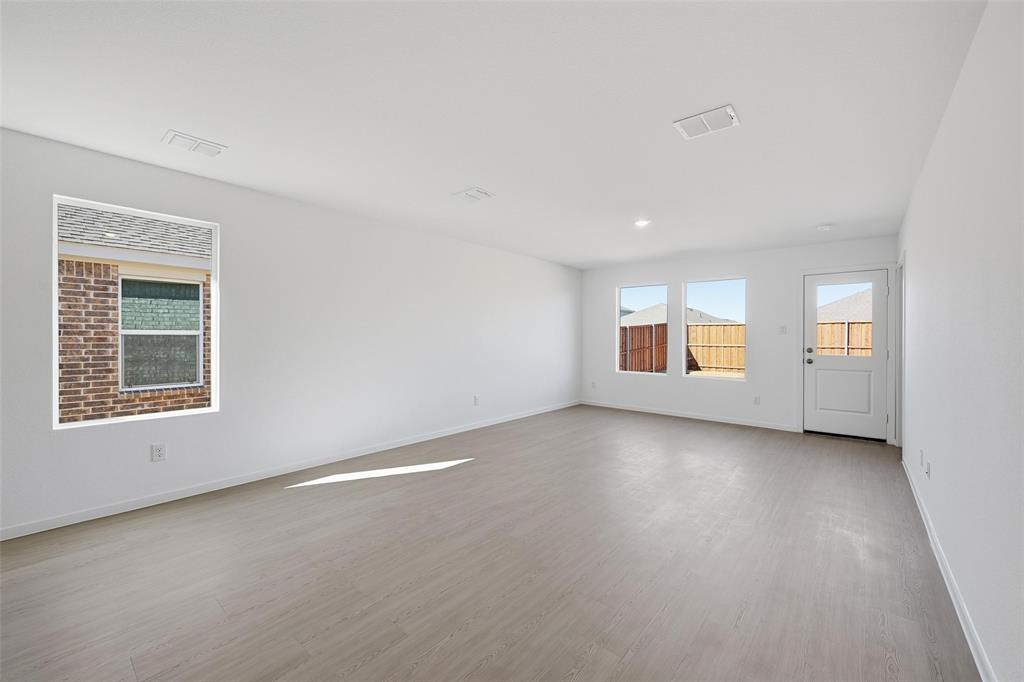 1613 Elliott Road Howe, TX 75459 - Photo 7 of 19 an empty room with windows
