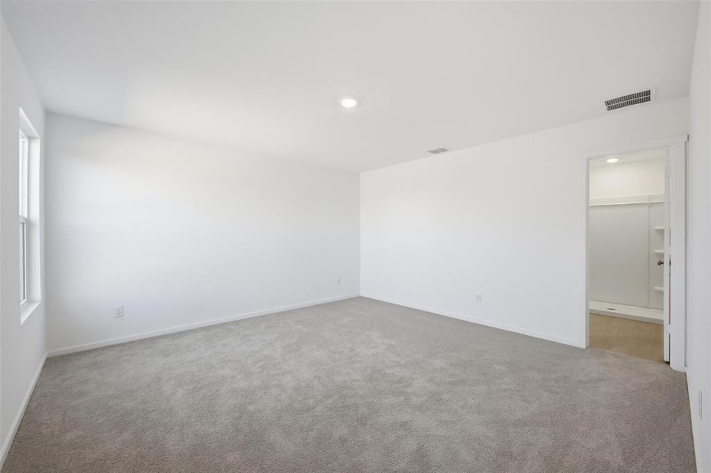 1613 Elliott Road Howe, TX 75459 - Photo 10 of 19 an empty room with an entryway