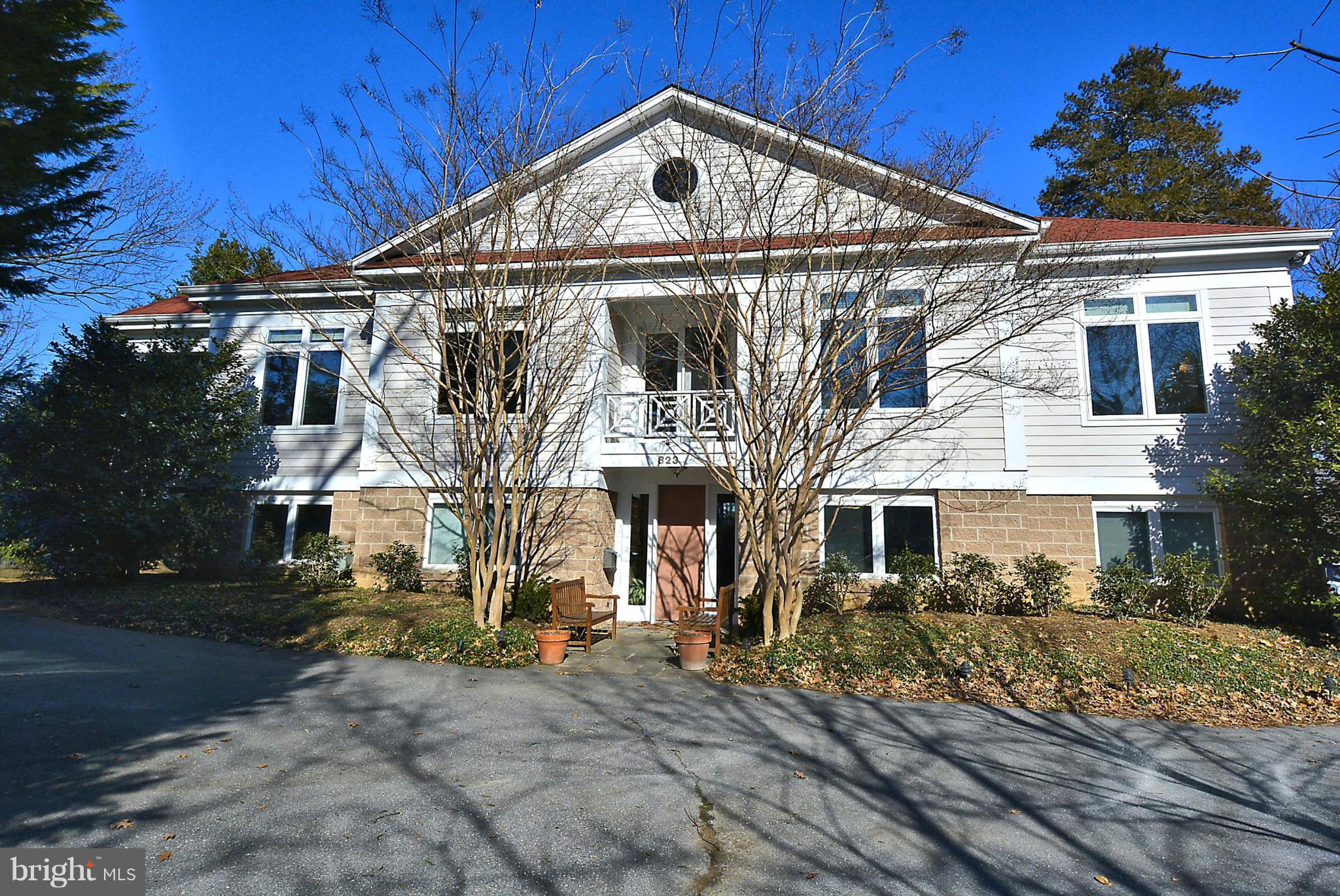 823 Rowen Road Silver Spring, MD 20910 - Photo 1 of 30 a view of a big house with wooden fence