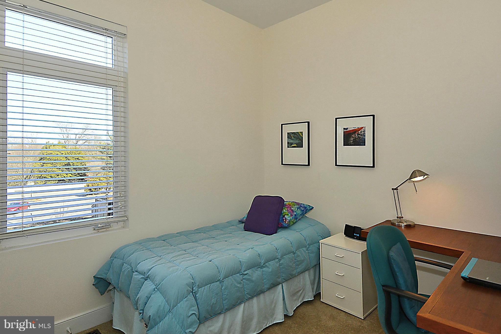 823 Rowen Road Silver Spring, MD 20910 - Photo 13 of 30 a bedroom with a bed and a window