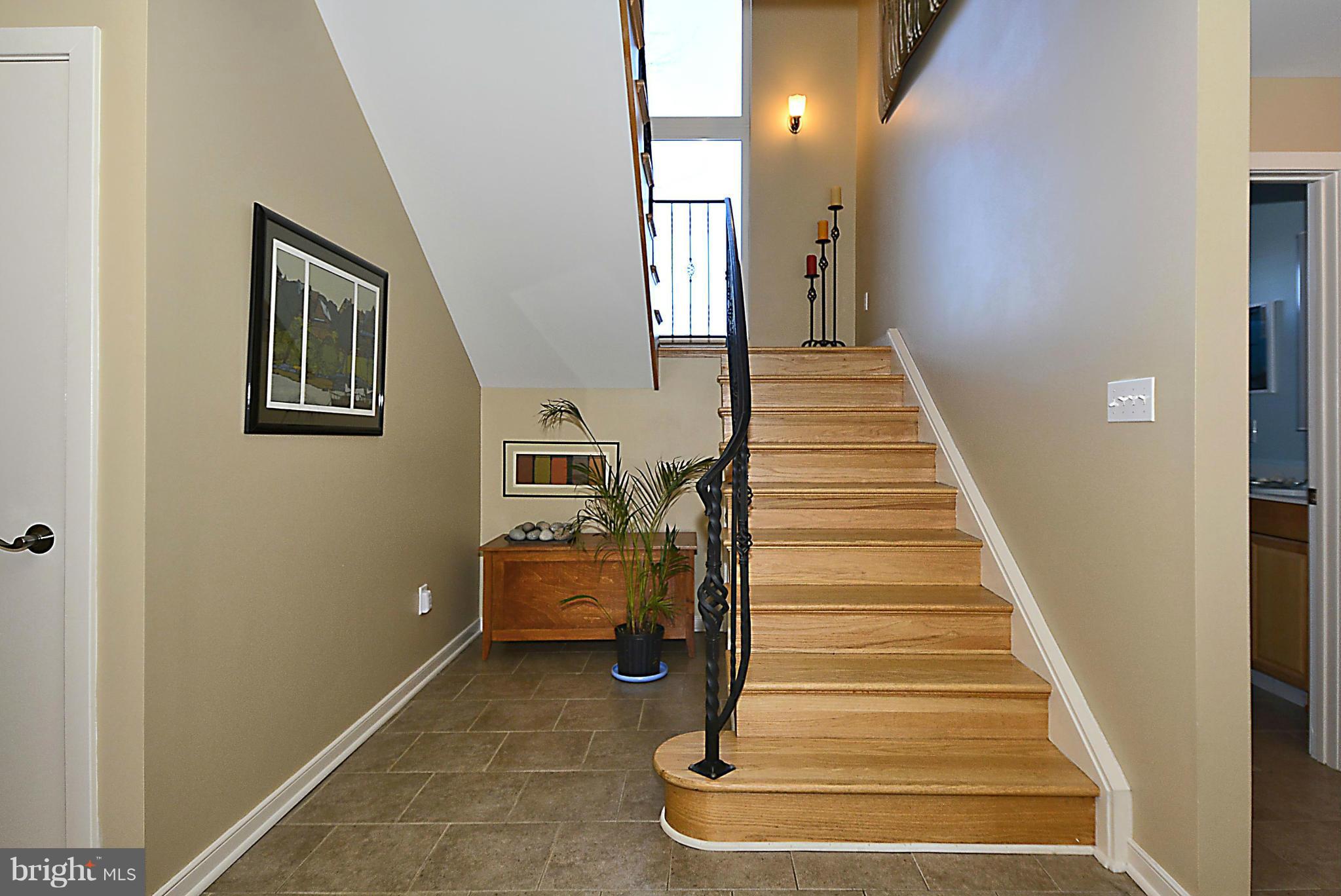 823 Rowen Road Silver Spring, MD 20910 - Photo 3 of 30 a view of entryway and hall with wooden floor