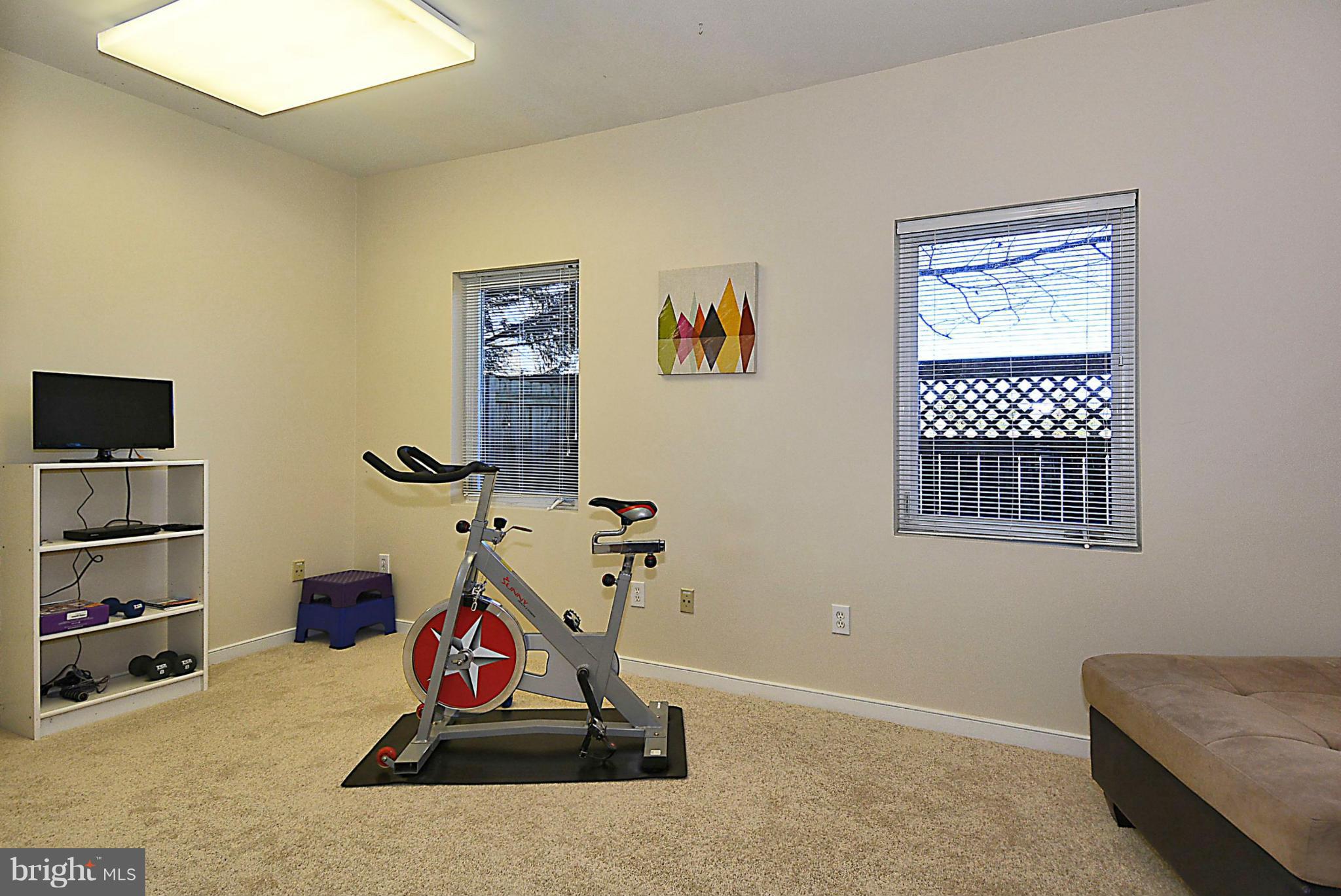 823 Rowen Road Silver Spring, MD 20910 - Photo 22 of 30 a room with gym equipment