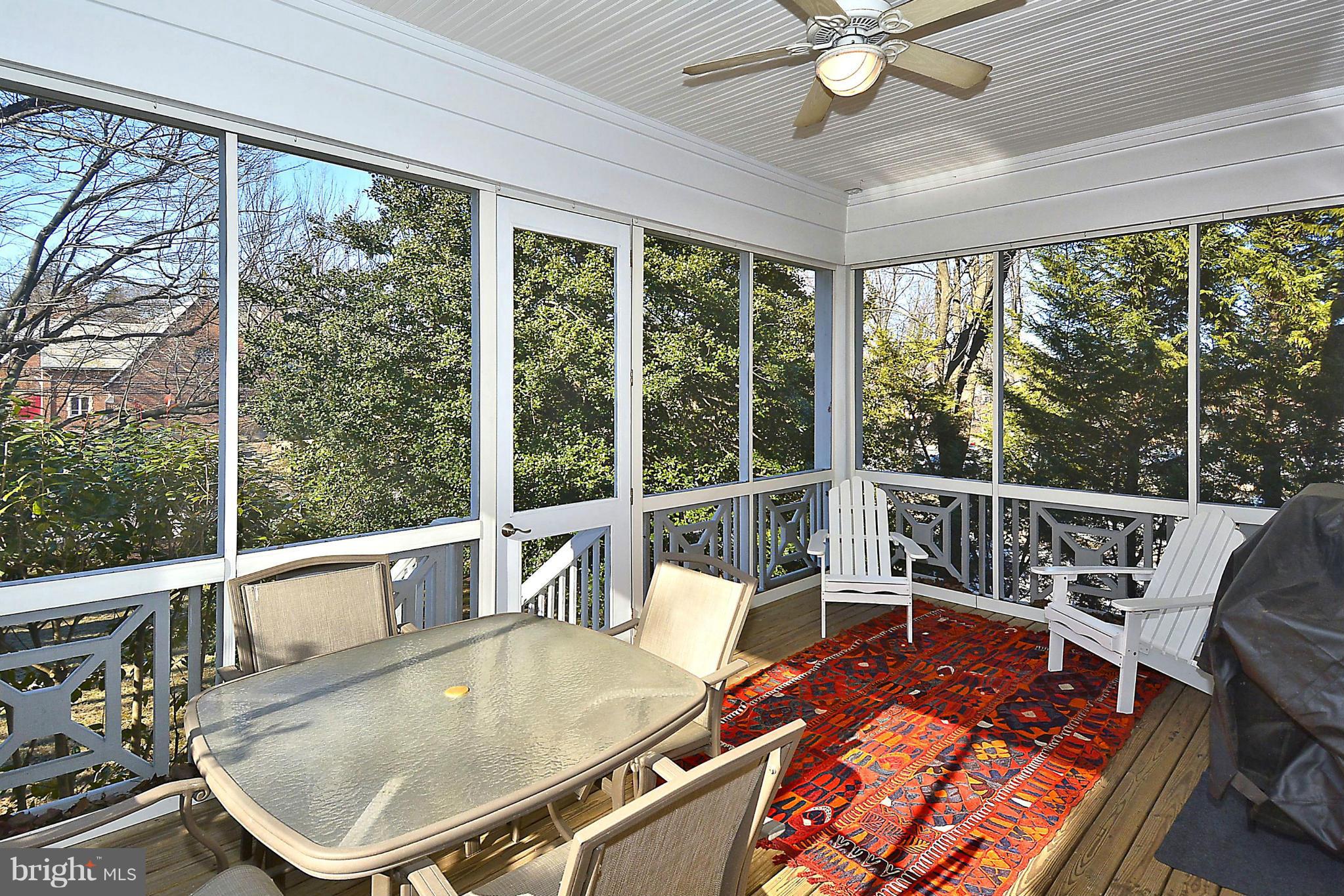 823 Rowen Road Silver Spring, MD 20910 - Photo 24 of 30 a balcony with furniture and large windows