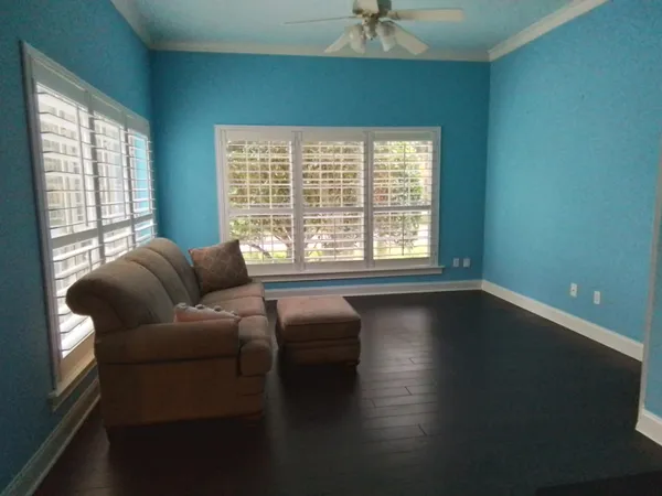 a bedroom with a bed and a mirror