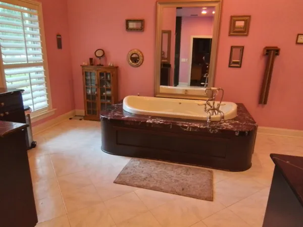 a bathroom with a sink and a bathtub