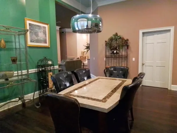 a view of swimming pool with a yard