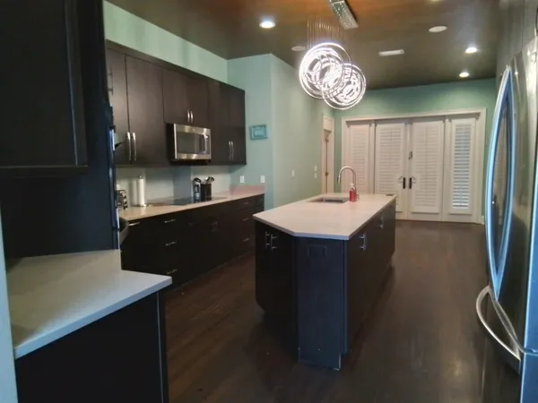 a bedroom with a bed and a table