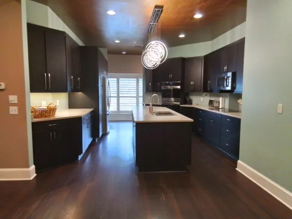 a room with furniture and mirror