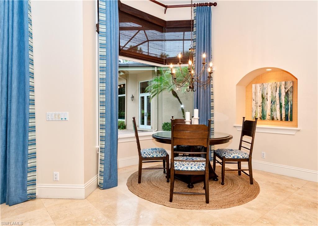3110 Dahlia Way Naples, FL 34105 - Photo 21 of 35 a view of a dining room with furniture window and outside view